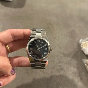 Michael Kors stainless steel watch with Navy sparkle face, needs battery